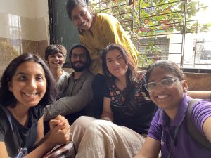 Group of students sitting in the community center